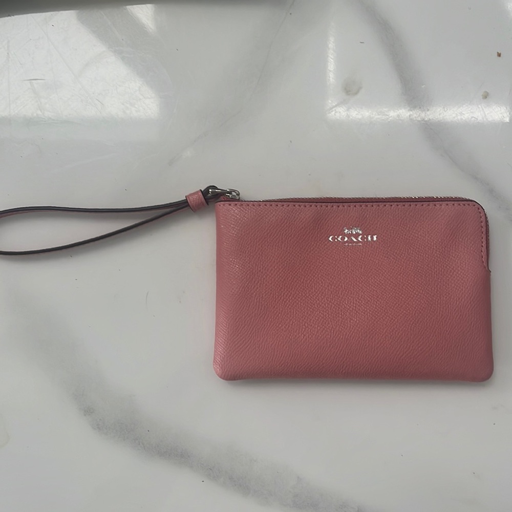 Baby pink coach wristlet. Never used!